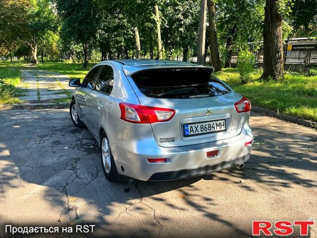 Серый Мицубиси Лансер, объемом двигателя 1.8 л и пробегом 246 тыс. км за 5600 $, фото 1 на Automoto.ua