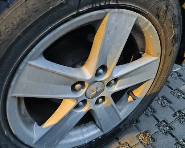 Сірий Міцубісі Lancer, об'ємом двигуна 1.8 л та пробігом 167 тис. км за 8400 $, фото 5 на Automoto.ua
