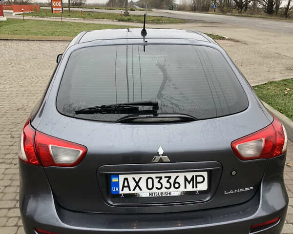Сірий Міцубісі Lancer, об'ємом двигуна 1.8 л та пробігом 44 тис. км за 5299 $, фото 12 на Automoto.ua