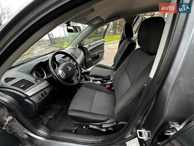 Серый Мицубиси Лансер, объемом двигателя 1.8 л и пробегом 44 тыс. км за 6499 $, фото 20 на Automoto.ua