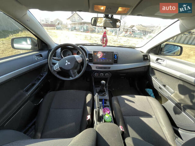 Серый Мицубиси Лансер, объемом двигателя 1.5 л и пробегом 139 тыс. км за 6600 $, фото 14 на Automoto.ua