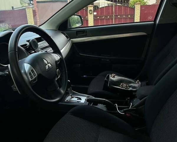 Сірий Міцубісі Lancer, об'ємом двигуна 1.8 л та пробігом 194 тис. км за 6100 $, фото 11 на Automoto.ua
