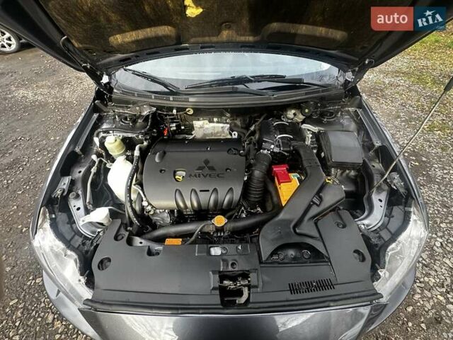 Серый Мицубиси Лансер, объемом двигателя 1.8 л и пробегом 44 тыс. км за 6499 $, фото 30 на Automoto.ua