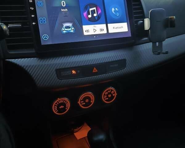 Серый Мицубиси Лансер, объемом двигателя 1.8 л и пробегом 167 тыс. км за 8600 $, фото 3 на Automoto.ua