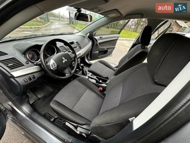 Серый Мицубиси Лансер, объемом двигателя 1.8 л и пробегом 44 тыс. км за 6499 $, фото 21 на Automoto.ua