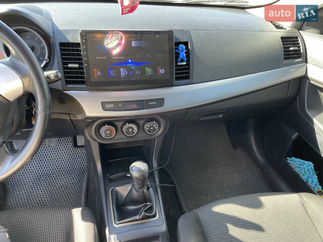 Серый Мицубиси Лансер, объемом двигателя 1.5 л и пробегом 139 тыс. км за 6600 $, фото 16 на Automoto.ua