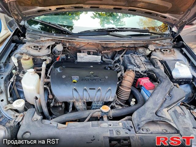 Сірий Міцубісі Lancer, об'ємом двигуна 1.8 л та пробігом 277 тис. км за 6500 $, фото 5 на Automoto.ua