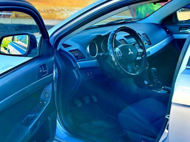 Сірий Міцубісі Lancer, об'ємом двигуна 18 л та пробігом 230 тис. км за 6900 $, фото 6 на Automoto.ua