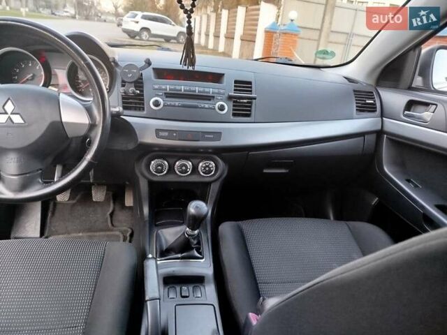 Сірий Міцубісі Lancer, об'ємом двигуна 1.59 л та пробігом 223 тис. км за 6700 $, фото 13 на Automoto.ua