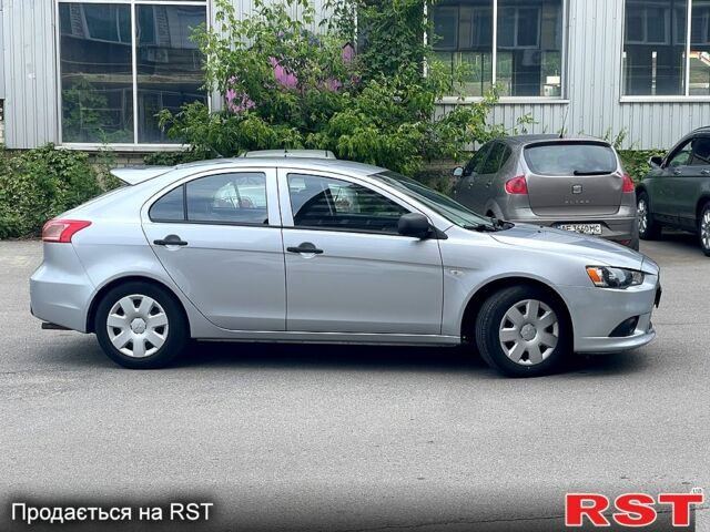 Сірий Міцубісі Lancer, об'ємом двигуна 1.6 л та пробігом 175 тис. км за 6099 $, фото 2 на Automoto.ua