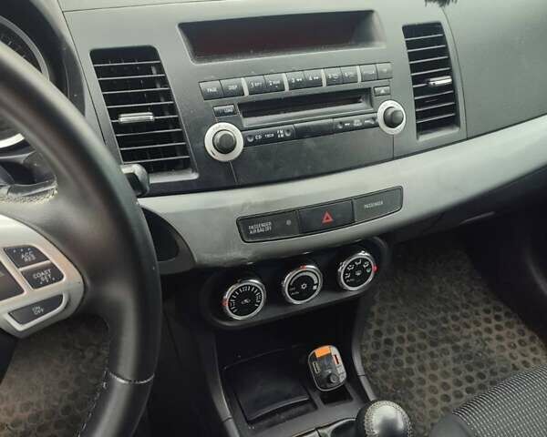 Сірий Міцубісі Lancer, об'ємом двигуна 1.8 л та пробігом 216 тис. км за 7200 $, фото 5 на Automoto.ua