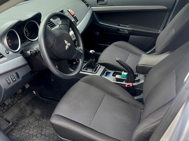 Сірий Міцубісі Lancer, об'ємом двигуна 1.6 л та пробігом 175 тис. км за 6099 $, фото 6 на Automoto.ua