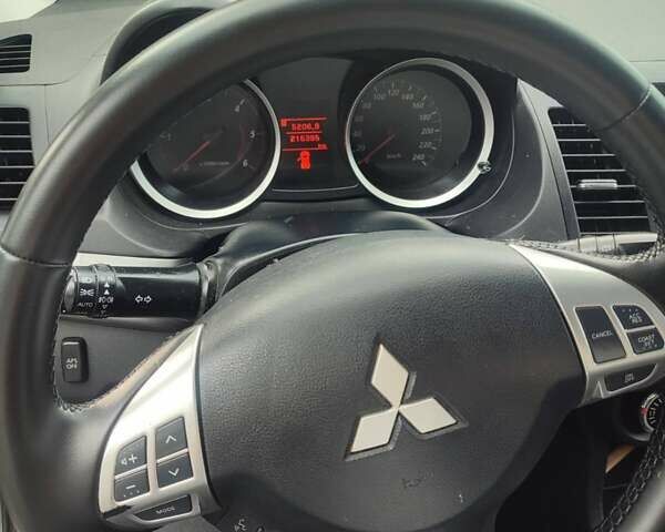 Сірий Міцубісі Lancer, об'ємом двигуна 1.8 л та пробігом 216 тис. км за 7200 $, фото 3 на Automoto.ua