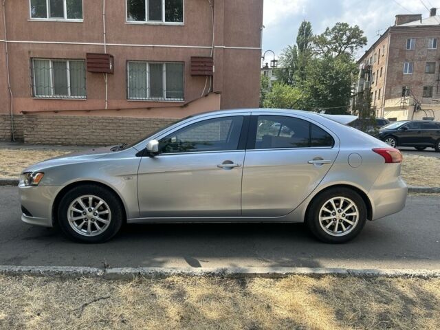 Серый Мицубиси Лансер, объемом двигателя 1.6 л и пробегом 94 тыс. км за 7999 $, фото 2 на Automoto.ua