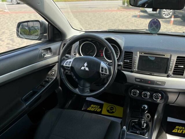 Сірий Міцубісі Lancer, об'ємом двигуна 0 л та пробігом 183 тис. км за 8219 $, фото 19 на Automoto.ua