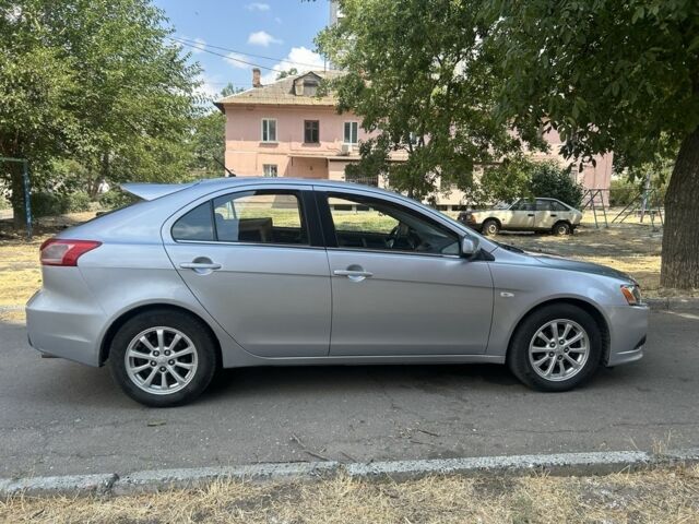 Серый Мицубиси Лансер, объемом двигателя 1.6 л и пробегом 94 тыс. км за 7999 $, фото 3 на Automoto.ua