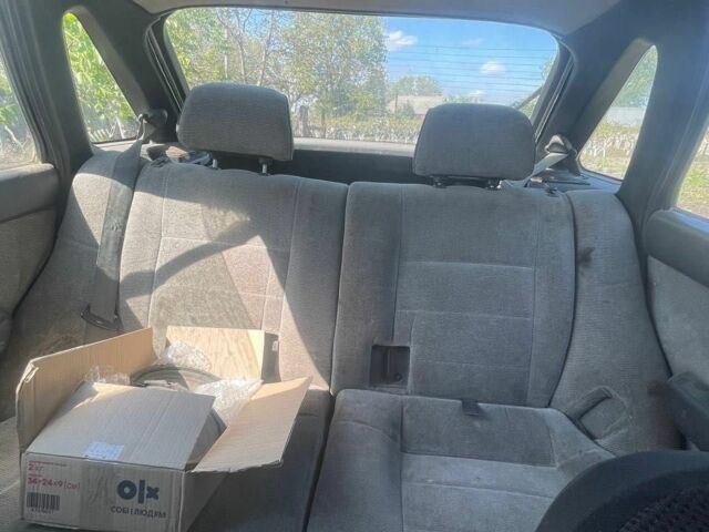 Сірий Міцубісі Lancer, об'ємом двигуна 1.5 л та пробігом 678 тис. км за 474 $, фото 5 на Automoto.ua