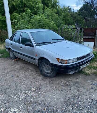 Сірий Міцубісі Lancer, об'ємом двигуна 1.5 л та пробігом 678 тис. км за 474 $, фото 4 на Automoto.ua