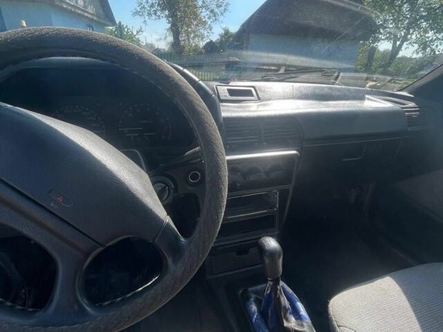 Сірий Міцубісі Lancer, об'ємом двигуна 1.5 л та пробігом 678 тис. км за 474 $, фото 7 на Automoto.ua