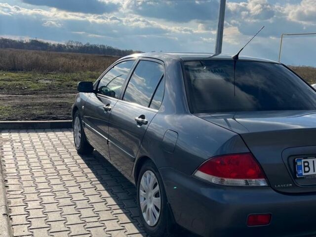 Сірий Міцубісі Lancer, об'ємом двигуна 1.6 л та пробігом 255 тис. км за 4200 $, фото 2 на Automoto.ua