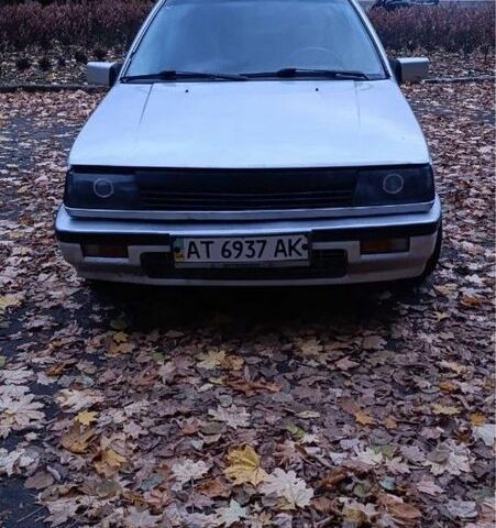 Сірий Міцубісі Lancer, об'ємом двигуна 1.5 л та пробігом 290 тис. км за 600 $, фото 1 на Automoto.ua