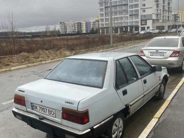 Сірий Міцубісі Lancer, об'ємом двигуна 0.13 л та пробігом 220 тис. км за 500 $, фото 2 на Automoto.ua