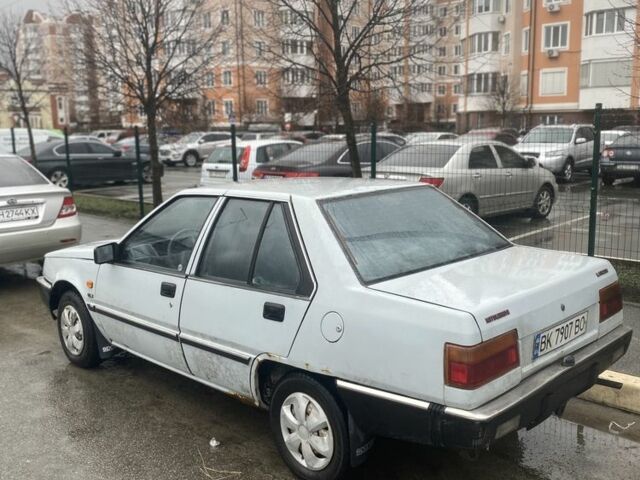 Сірий Міцубісі Lancer, об'ємом двигуна 0.13 л та пробігом 220 тис. км за 500 $, фото 3 на Automoto.ua