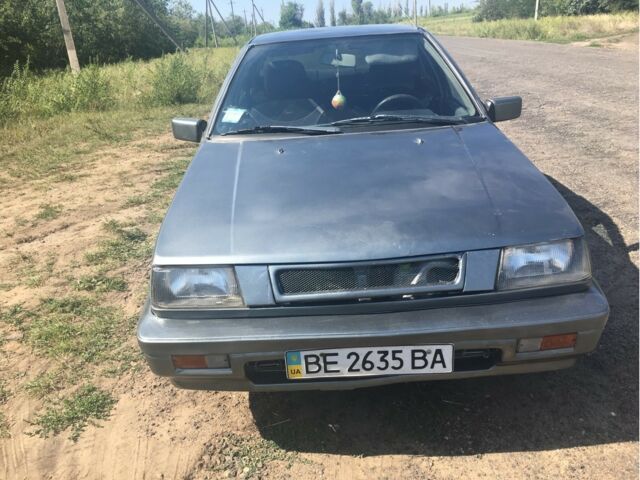 Сірий Міцубісі Lancer, об'ємом двигуна 1.5 л та пробігом 30 тис. км за 1400 $, фото 1 на Automoto.ua