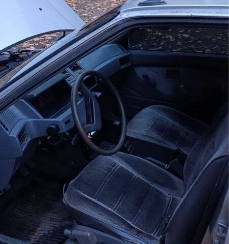 Сірий Міцубісі Lancer, об'ємом двигуна 1.5 л та пробігом 290 тис. км за 600 $, фото 3 на Automoto.ua