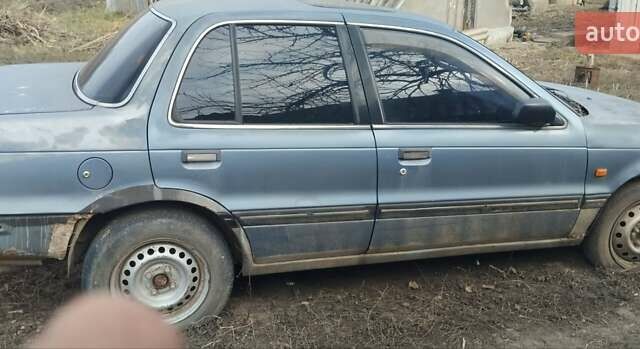 Сірий Міцубісі Lancer, об'ємом двигуна 1.5 л та пробігом 125 тис. км за 720 $, фото 2 на Automoto.ua