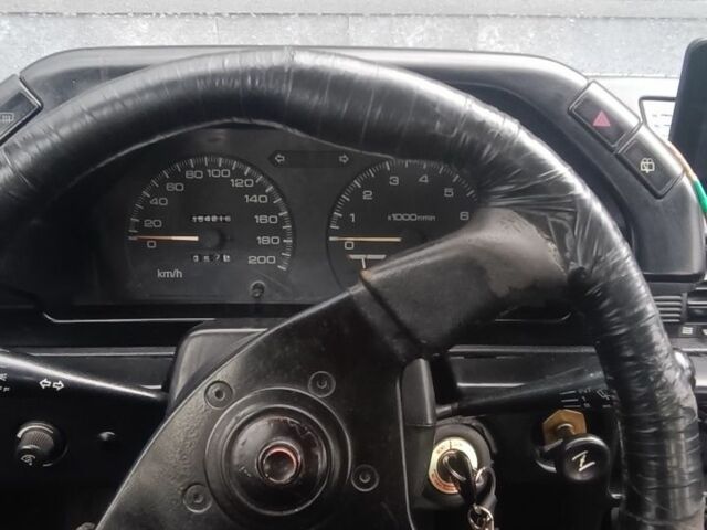 Серый Мицубиси Лансер, объемом двигателя 1.5 л и пробегом 450 тыс. км за 550 $, фото 5 на Automoto.ua