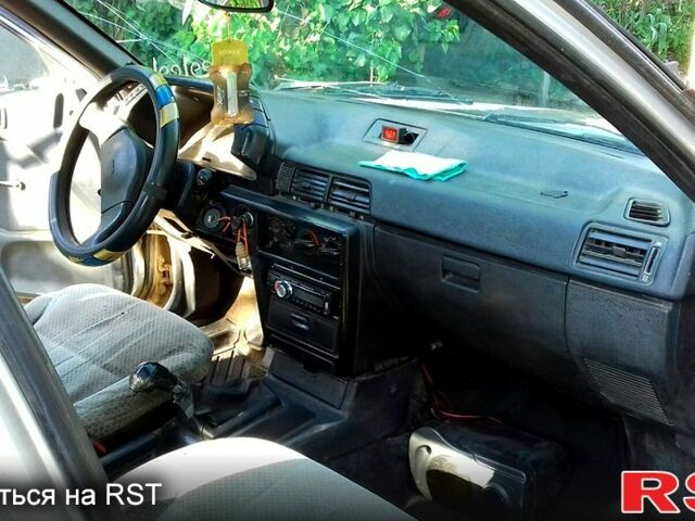 Сірий Міцубісі Lancer, об'ємом двигуна 1.8 л та пробігом 30 тис. км за 850 $, фото 1 на Automoto.ua