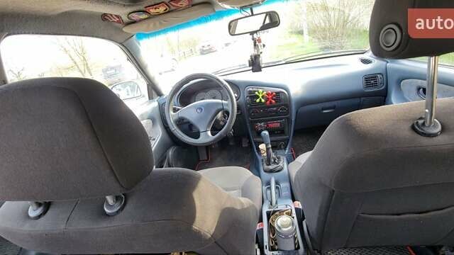 Серый Мицубиси Лансер, объемом двигателя 1.6 л и пробегом 334 тыс. км за 2200 $, фото 2 на Automoto.ua