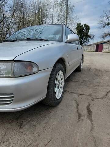 Серый Мицубиси Лансер, объемом двигателя 1.6 л и пробегом 334 тыс. км за 2200 $, фото 10 на Automoto.ua