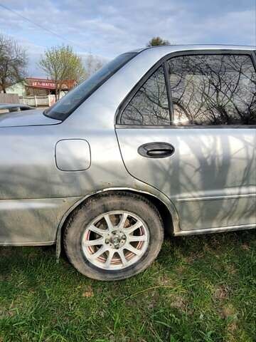 Серый Мицубиси Лансер, объемом двигателя 1.6 л и пробегом 334 тыс. км за 2200 $, фото 4 на Automoto.ua