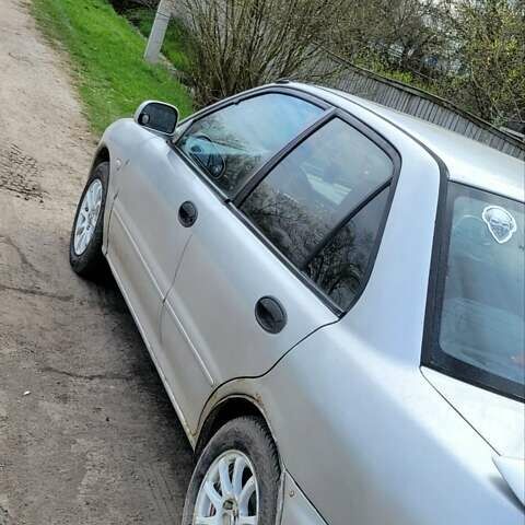 Серый Мицубиси Лансер, объемом двигателя 1.6 л и пробегом 334 тыс. км за 2200 $, фото 7 на Automoto.ua