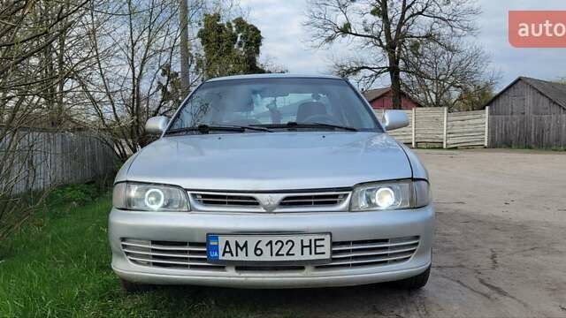 Серый Мицубиси Лансер, объемом двигателя 1.6 л и пробегом 334 тыс. км за 2200 $, фото 1 на Automoto.ua