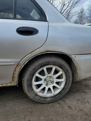 Серый Мицубиси Лансер, объемом двигателя 1.6 л и пробегом 334 тыс. км за 2200 $, фото 8 на Automoto.ua