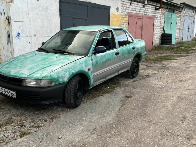 Сірий Міцубісі Lancer, об'ємом двигуна 1.3 л та пробігом 184 тис. км за 1000 $, фото 3 на Automoto.ua