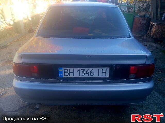 Сірий Міцубісі Lancer, об'ємом двигуна 1.3 л та пробігом 0 тис. км за 1200 $, фото 1 на Automoto.ua