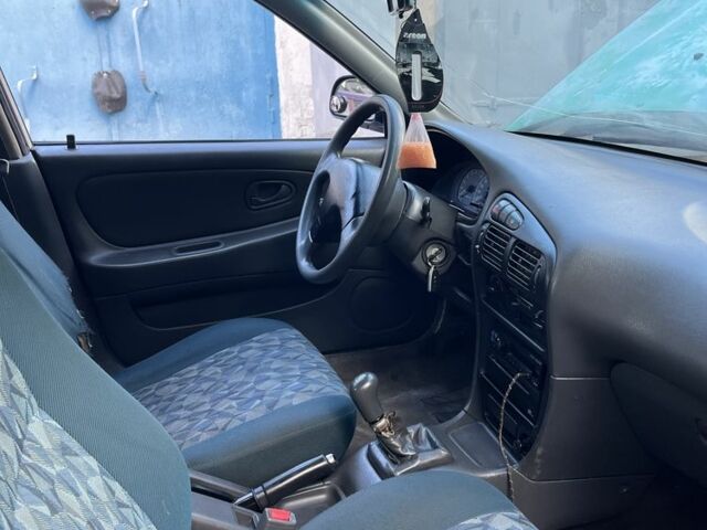 Сірий Міцубісі Lancer, об'ємом двигуна 1.3 л та пробігом 3 тис. км за 700 $, фото 4 на Automoto.ua