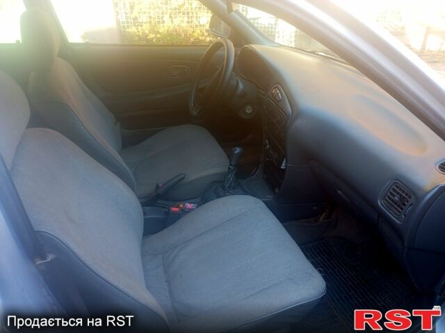 Сірий Міцубісі Lancer, об'ємом двигуна 1.3 л та пробігом 0 тис. км за 1200 $, фото 5 на Automoto.ua