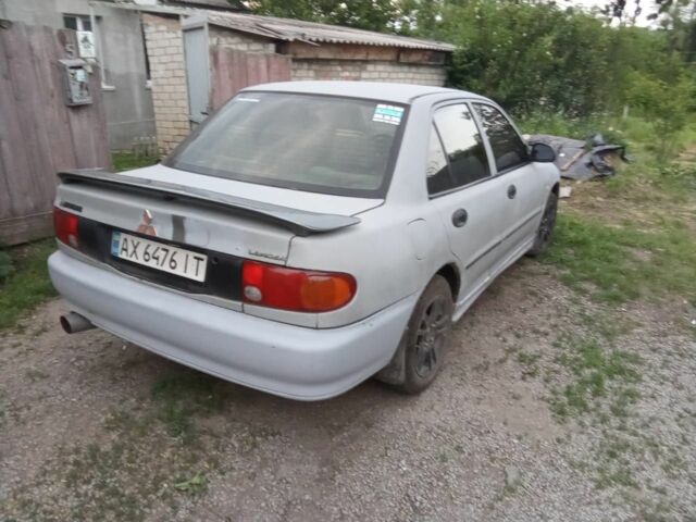 Сірий Міцубісі Lancer, об'ємом двигуна 0 л та пробігом 361 тис. км за 1384 $, фото 6 на Automoto.ua