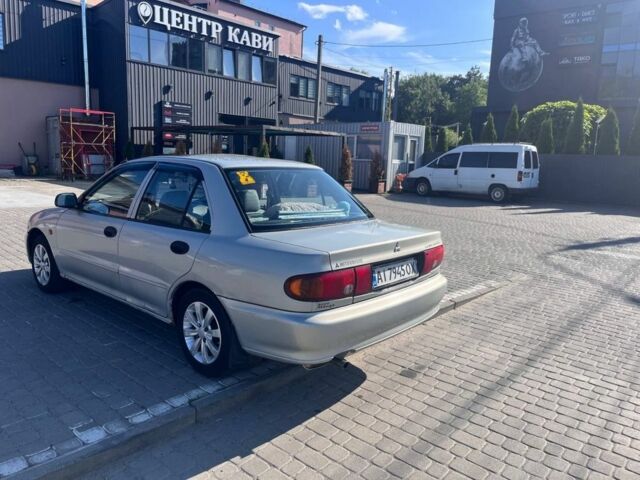 Сірий Міцубісі Lancer, об'ємом двигуна 1.3 л та пробігом 331 тис. км за 800 $, фото 5 на Automoto.ua