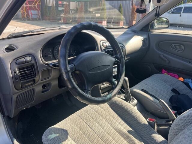 Сірий Міцубісі Lancer, об'ємом двигуна 1.3 л та пробігом 331 тис. км за 800 $, фото 7 на Automoto.ua