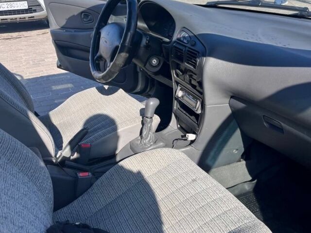 Сірий Міцубісі Lancer, об'ємом двигуна 1.3 л та пробігом 331 тис. км за 800 $, фото 8 на Automoto.ua