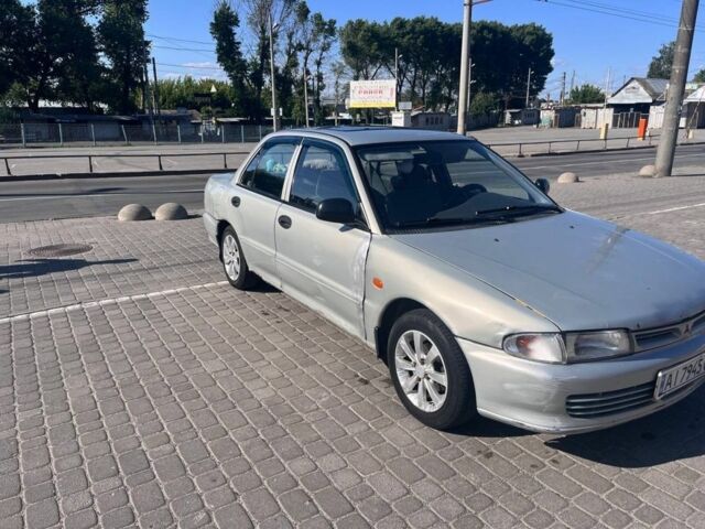Сірий Міцубісі Lancer, об'ємом двигуна 1.3 л та пробігом 331 тис. км за 800 $, фото 2 на Automoto.ua