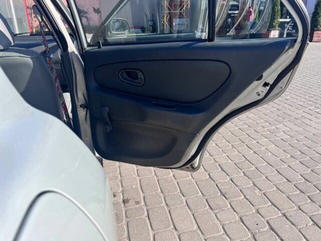 Сірий Міцубісі Lancer, об'ємом двигуна 1.3 л та пробігом 331 тис. км за 800 $, фото 9 на Automoto.ua