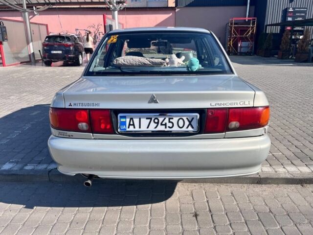 Сірий Міцубісі Lancer, об'ємом двигуна 1.3 л та пробігом 331 тис. км за 800 $, фото 11 на Automoto.ua