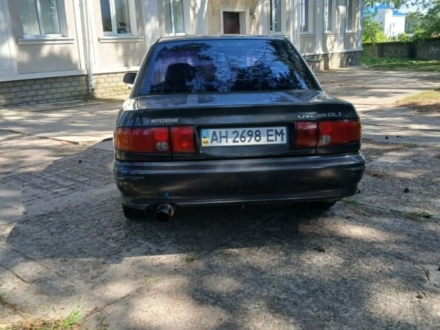 Серый Мицубиси Лансер, объемом двигателя 0 л и пробегом 111 тыс. км за 57000 $, фото 15 на Automoto.ua